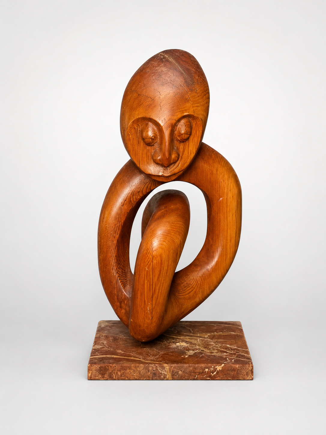 Wooden figure sculpture by Carlyle N. Matthew